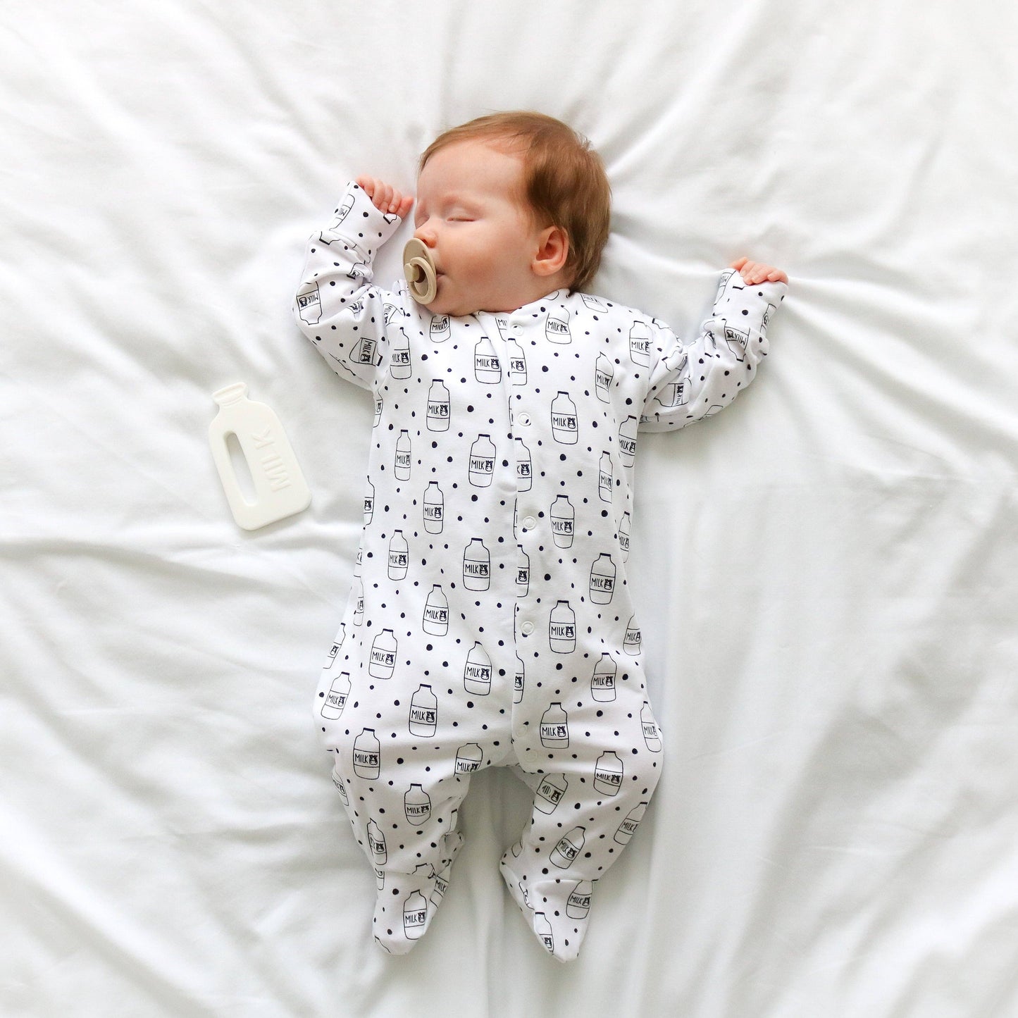 Fred & Noah - Milk Bottle cotton sleepsuit: Newborn