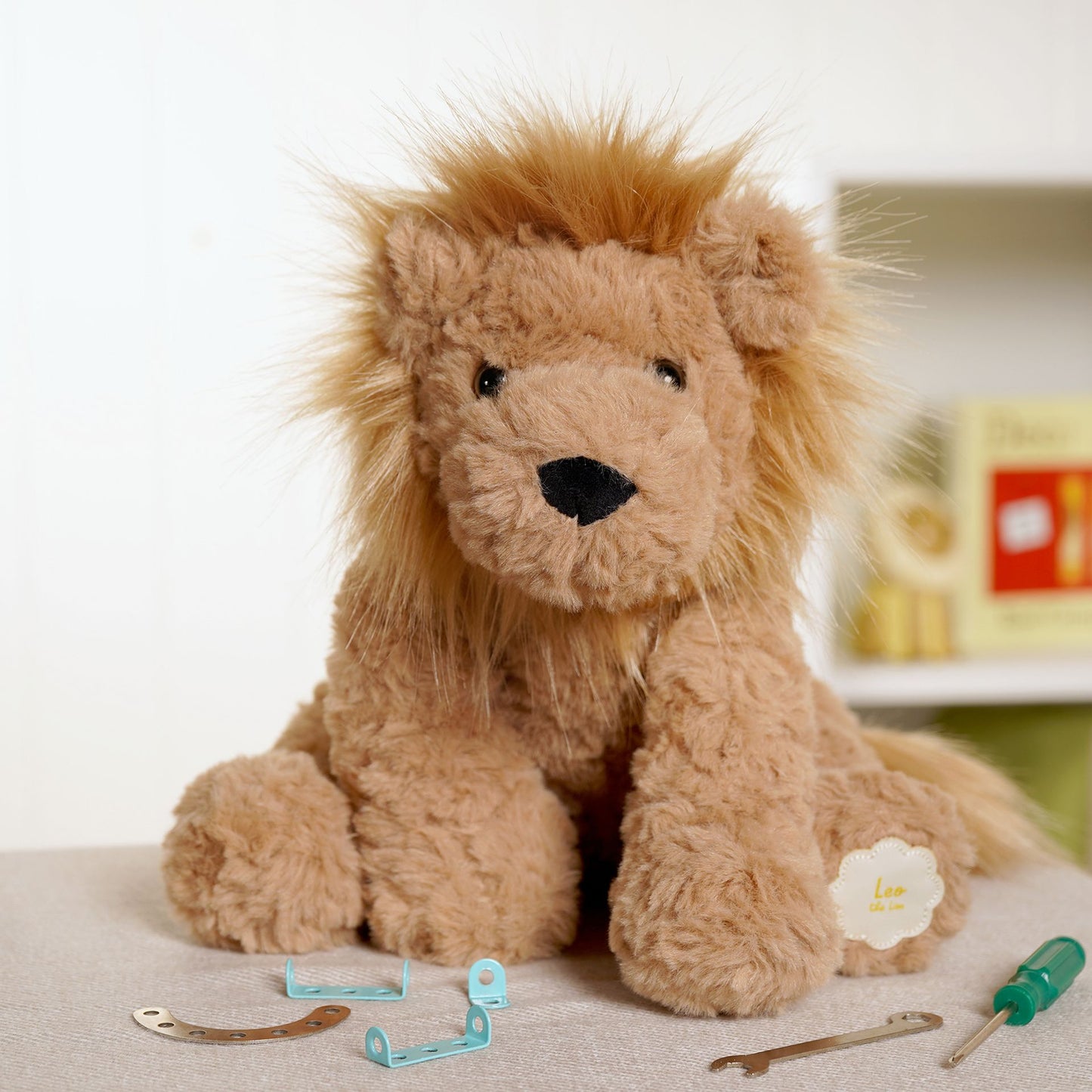 Leo the plush sitting brown lion 23cm