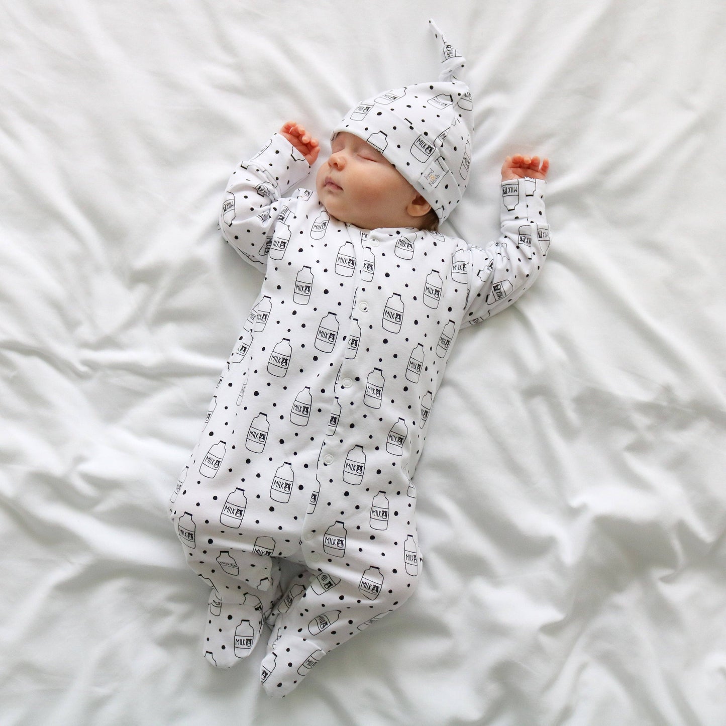 Fred & Noah - Milk Bottle cotton sleepsuit: Newborn