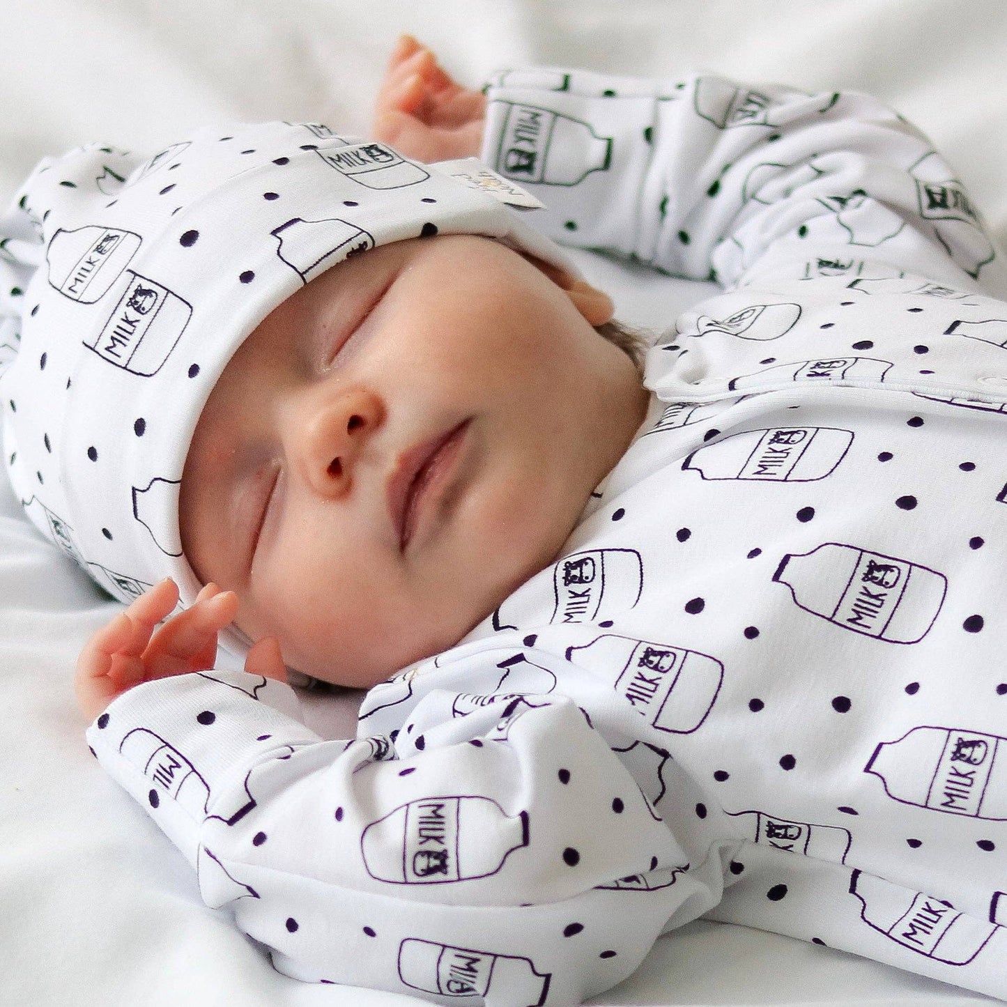 Fred & Noah - Milk Bottle cotton sleepsuit: Newborn