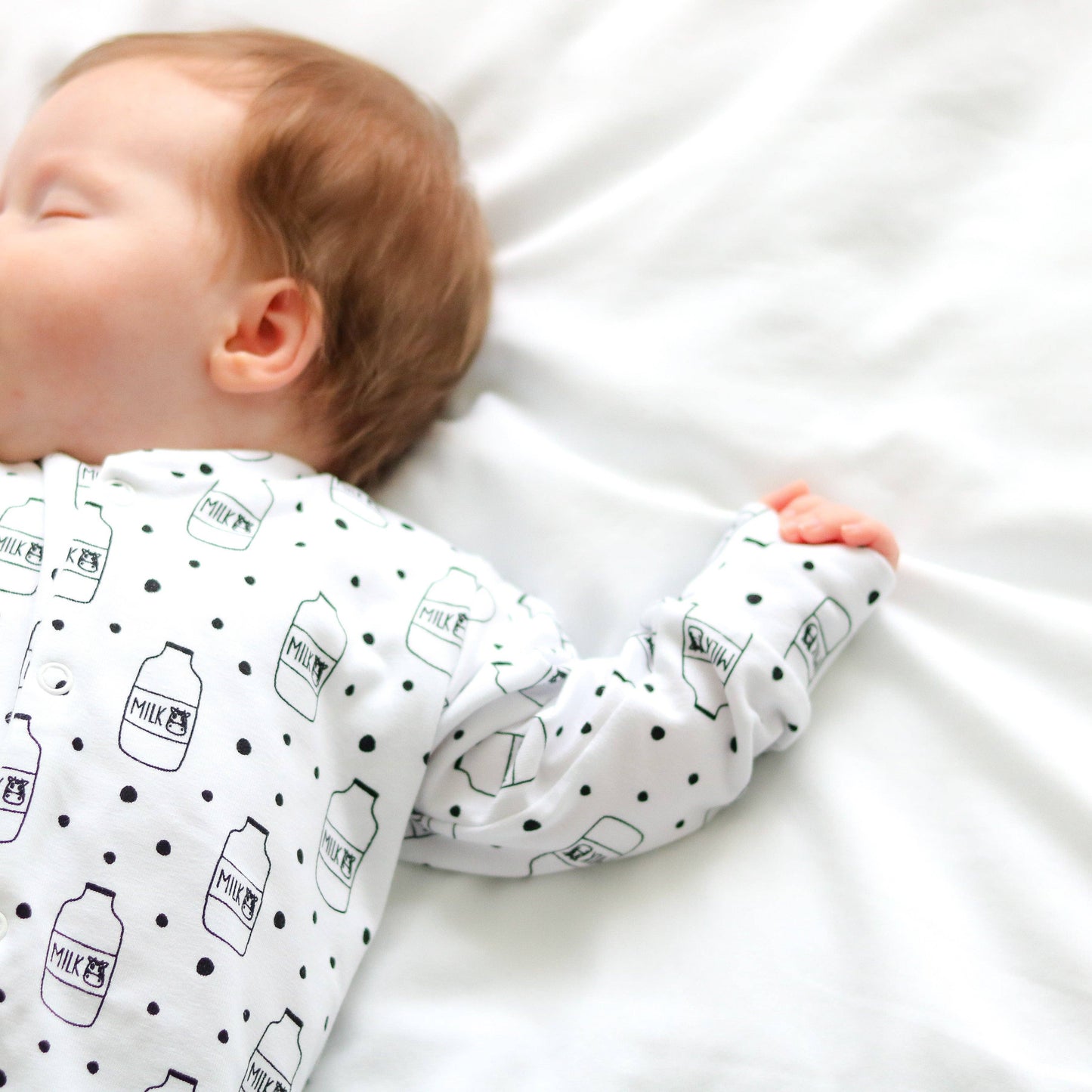 Fred & Noah - Milk Bottle cotton sleepsuit: Newborn