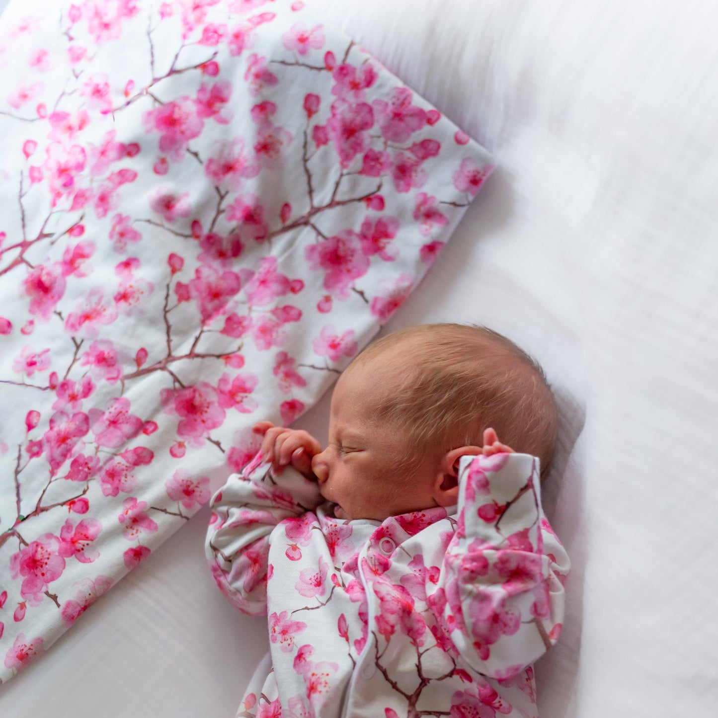 Fred & Noah - Cherry Blossom cotton Sleepsuit: Newborn